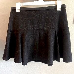 Black express pattered mini skirt